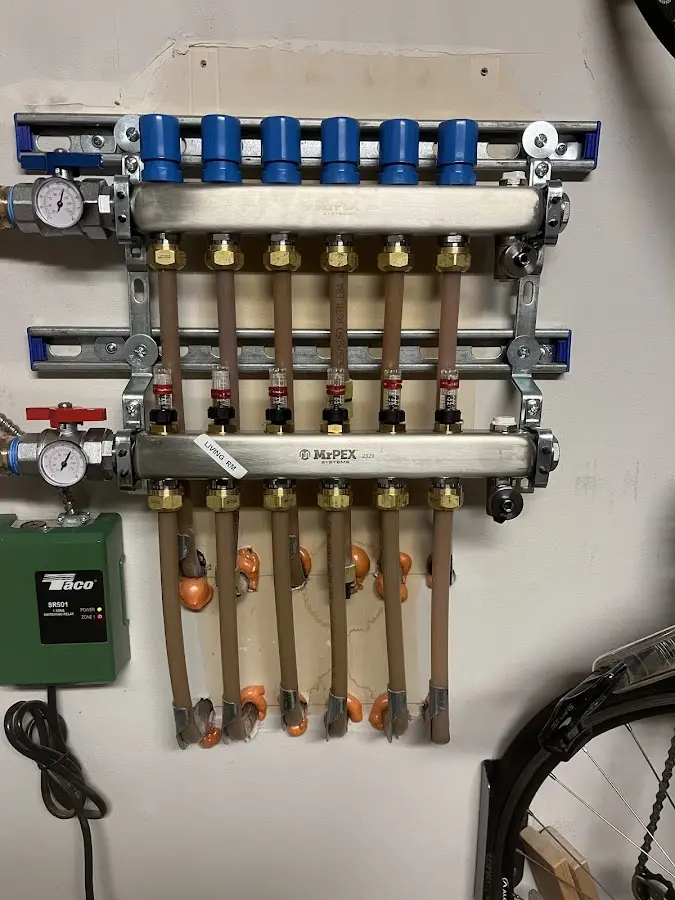 Plumber performing Gas Line Installation at a residential property in Douglass Hills